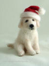 Sculpture of Golden Retriever Pup in Santa hat, felted