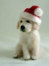 Figurine of Golden Retriever pup by Olga Timofeevski, Christmas themed felted art