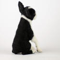 Needle felted dog facing back-right