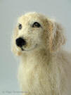 figurine of young Golden Retriever by Olga Timofeevski, close-up