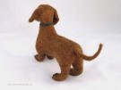 Needle felt dachshund, facing back left