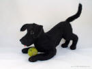 Needlefelt black Lab, side view, facing left