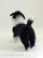 Needle felted statue of Bearded Collie mix, facing back