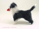 Needle felted Prince the dog with a valentine