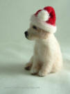 Golden Retriever puppy in Santa hat felted by Olga Timofeevski